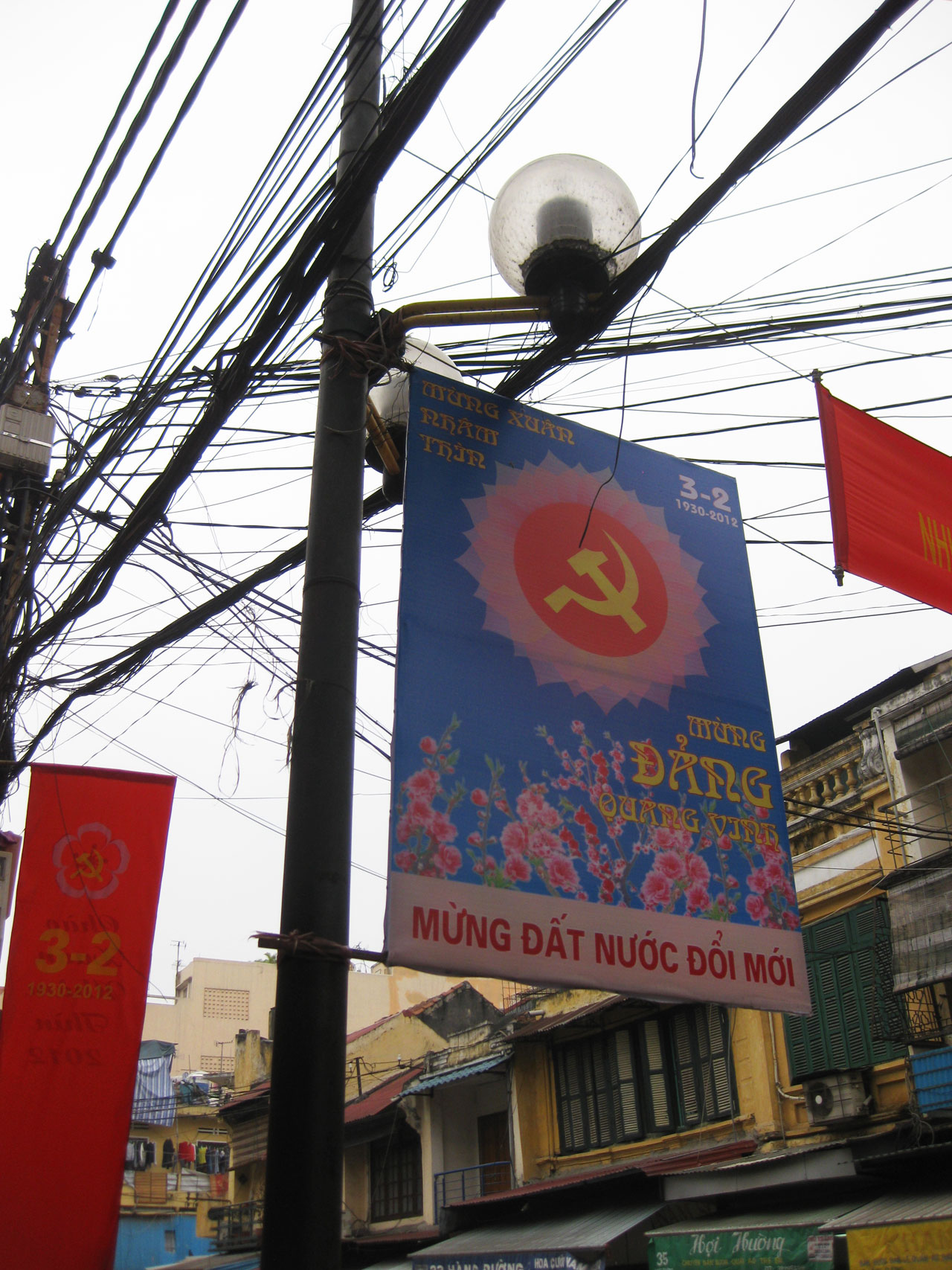 Dodgy wiring and communist propaganda in Hanoi's Old Quarter, Vietnam