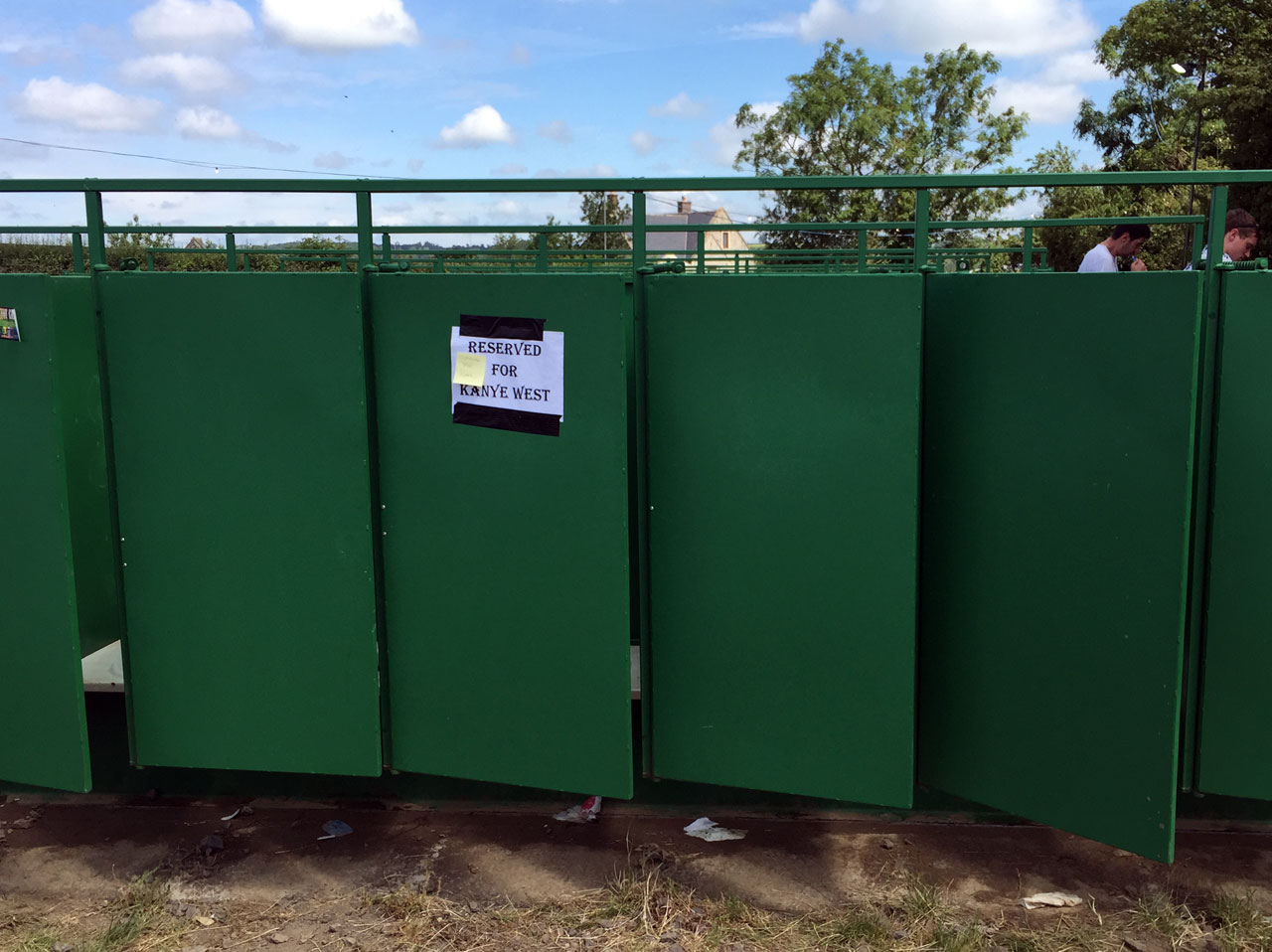 Long drop toilet marked 'Reserved for Kanye West'