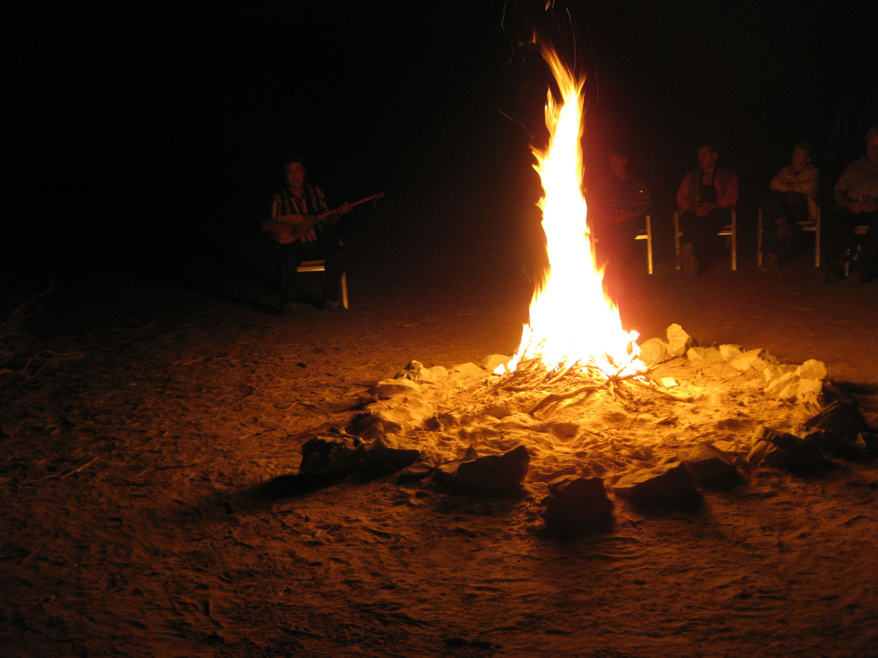 Traditional Kazakh songs around the campfire at Yangikazgan, Uzbekistan