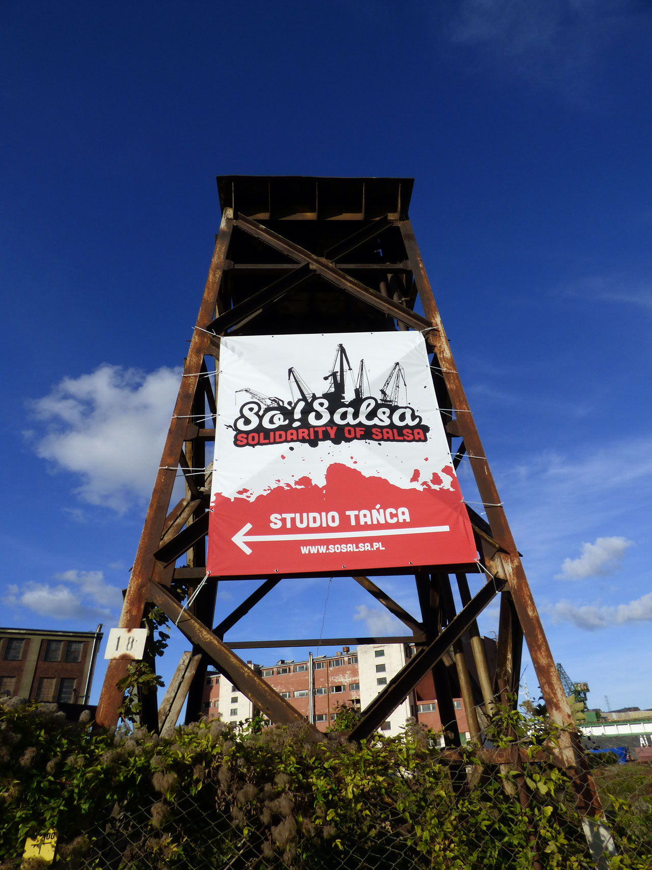 Sign reads 'Solidarity of Salsa'