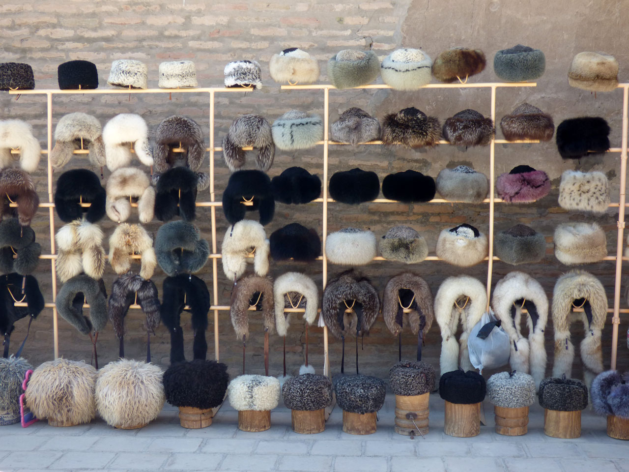 Souvenir hall selling various types of hat, Khiva